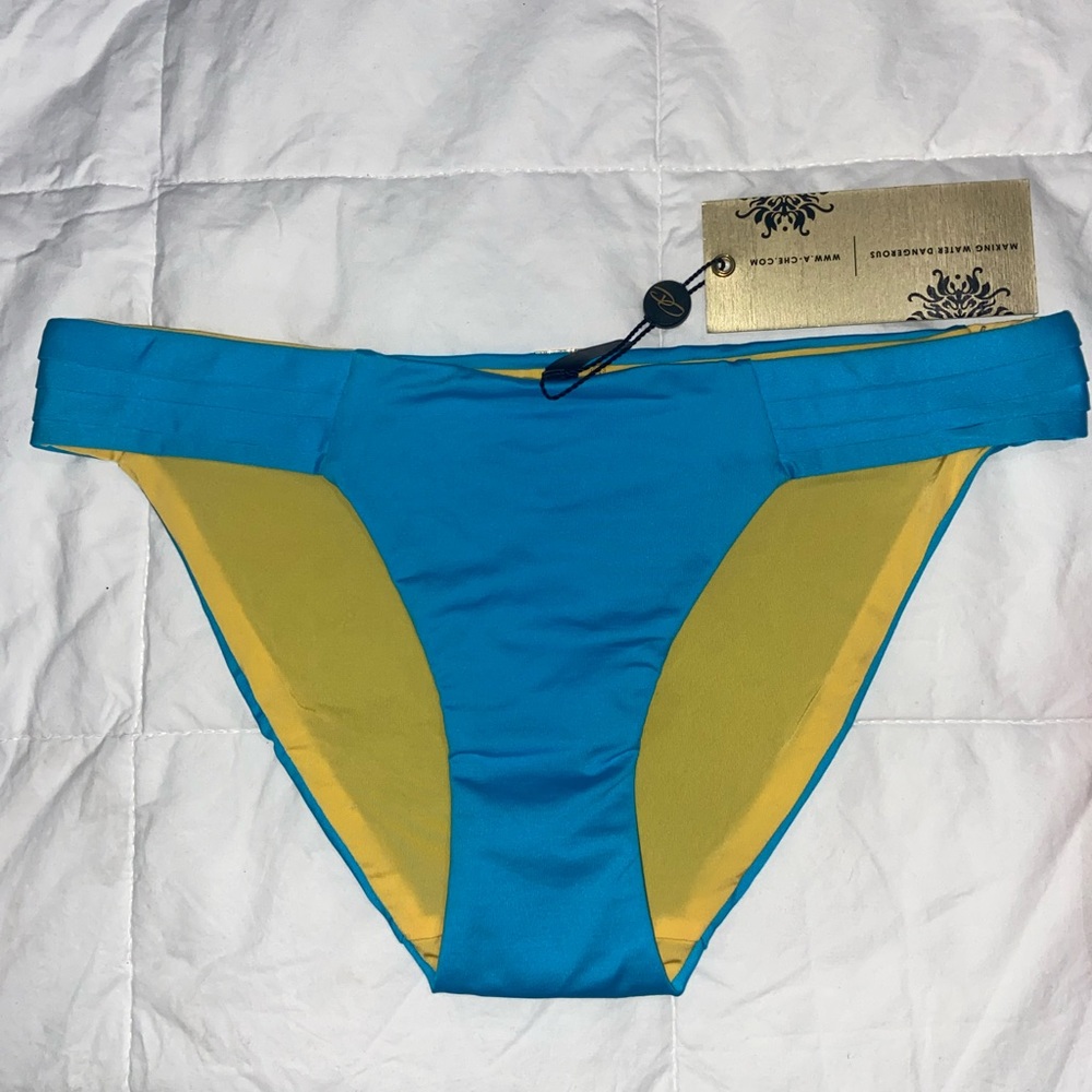A. Che bikini bottom. Teal/Yellow . New
